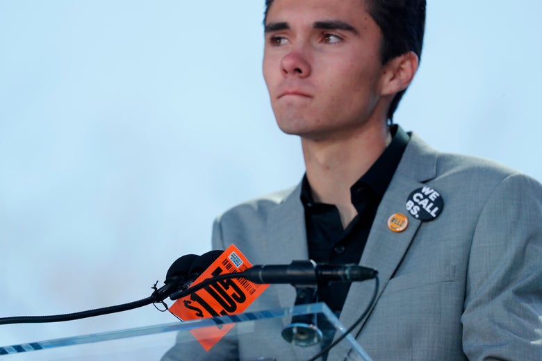 David Hogg, a student at the Marjory Stoneman Douglas High School, speaks with a $1.05 tag in front of him at the March for Our Lives rally in Washington, D.C. on March 24, 2018.